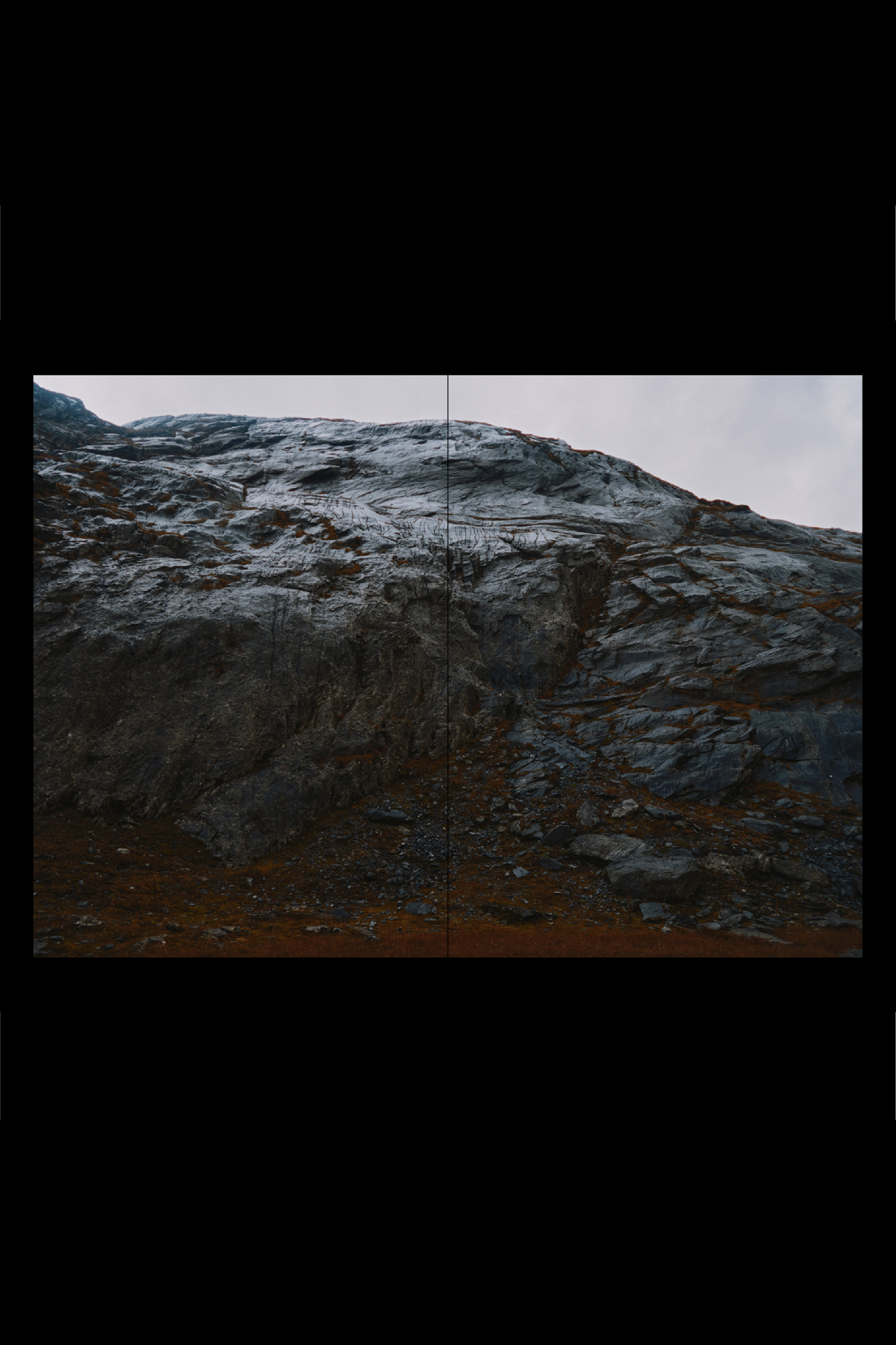 double spread of the publication that shows one large photography of a mountain