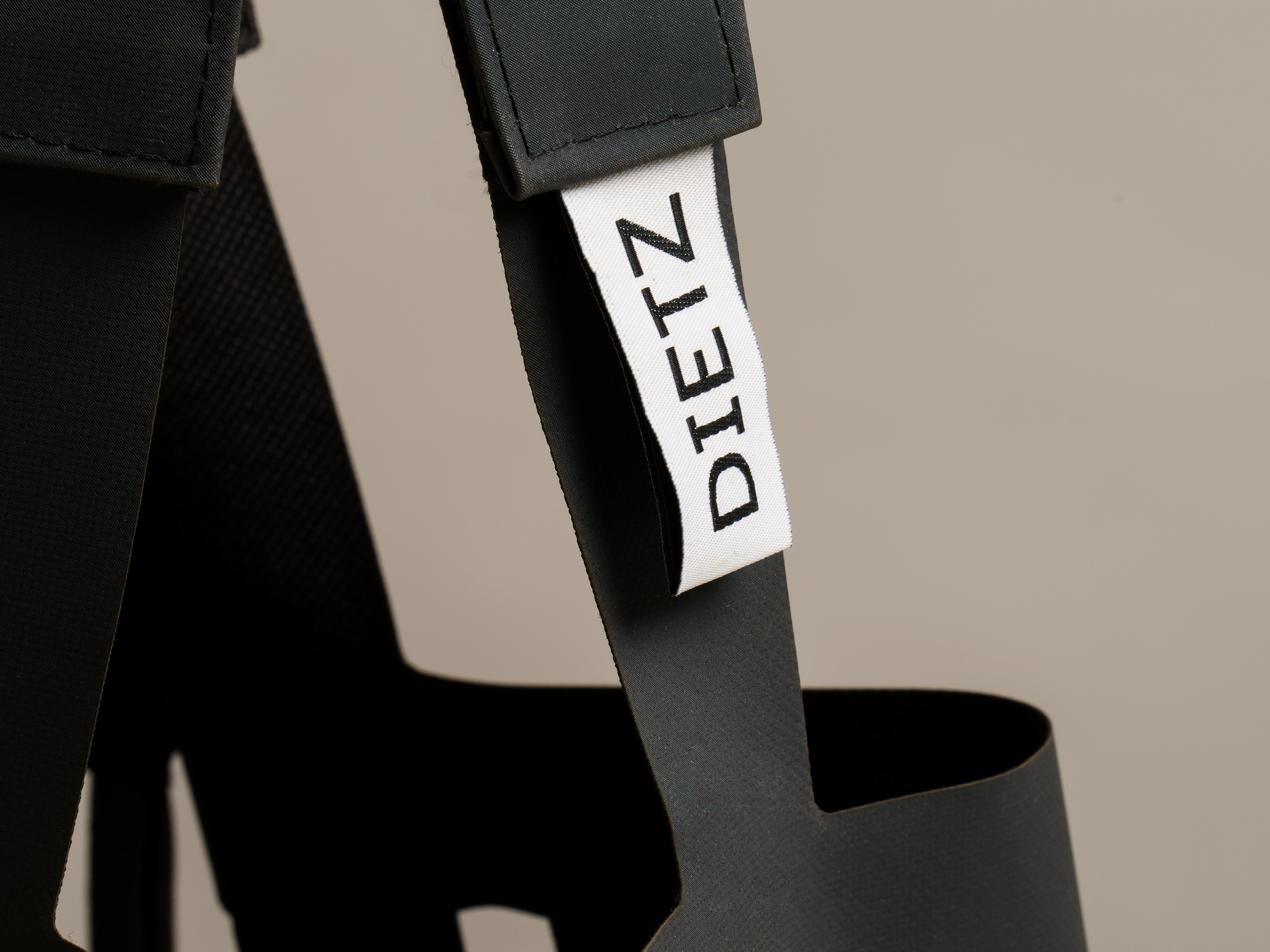 Detail of a black Good Buy! Dietz bag showing the label