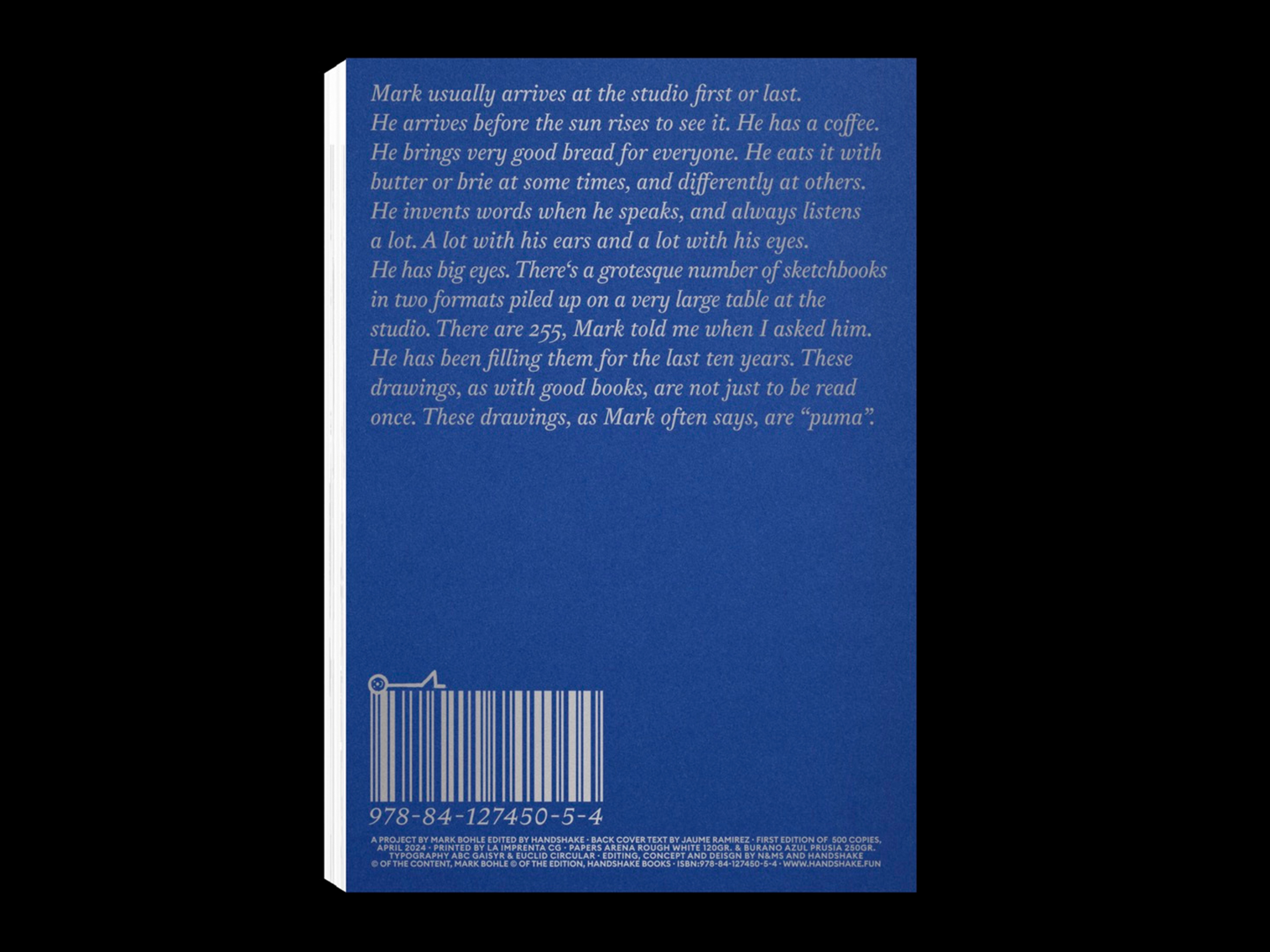 The back from the book. Blue background and silver text on top.